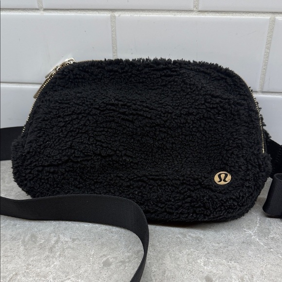 lululemon athletica Handbags - lululemon athletica Black Textured Crossbody Bag. Great condition